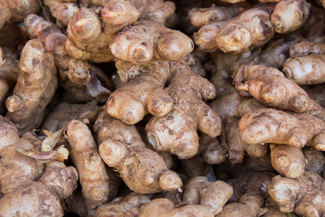 Root ginger isolated on market