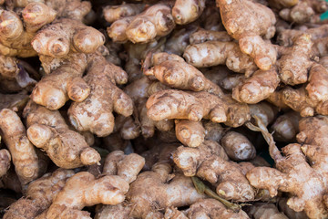 Root ginger isolated on market