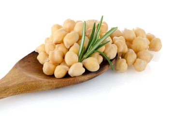 Chickpeas over wooden spoon