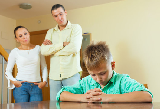 Parents  and teenager son having conflict