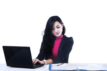 Businesswoman working on a laptop