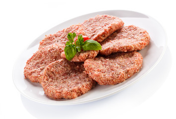 Raw minced pork chops meat on white background