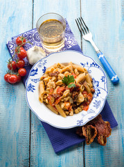 pasta with fish ragout and dried tomatoes