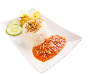 Nasi lemak a traditional and popular Malaysian spicy rice dish.