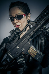 Fototapeta premium American, Sexy girl military woman posing with guns.