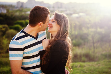 Naklejka premium Young couple in love outdoor