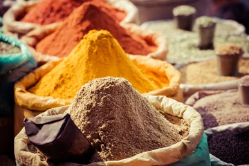 Foto op Canvas Indian colored spices at local market. © Curioso.Photography