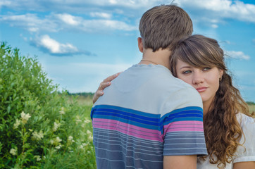 Young loving couple embracing  and smiling