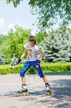 Young girl practising in a skate park