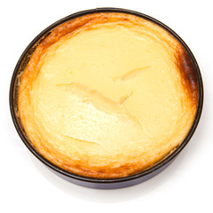 New York Cheesecake isolated on a white studio background.