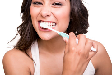 Naklejka premium Woman holding a tooth brush