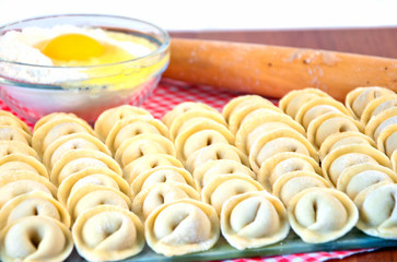 raw ravioli in a row