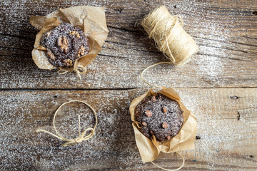 Sweet muffins wrapping with string.