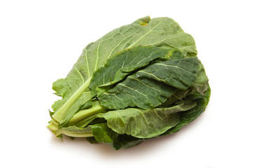 Spring Greens (Brassica oleracea ) isolated on a white studio ba