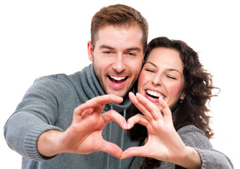 Valentine Couple. Girl and her Boyfriend making shape of Heart