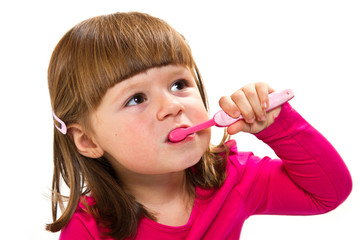 Little Smiling Curly Girl Brushing Teeth