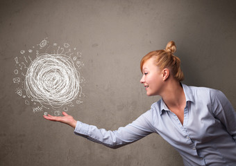 Chaos concept in the hand of a businesswoman