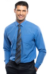 Handsome young man in blue shirt and tie 