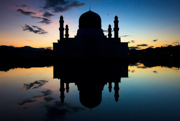 Silhouette and reflection of a mosque at Sabah, Borneo, Malaysia