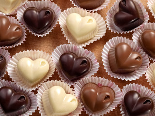 Black, white and milk chocolate candies