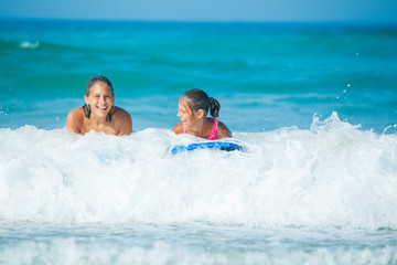 Summer vacation - surfer girls.