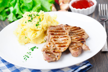 Grilled pork with mashed potato