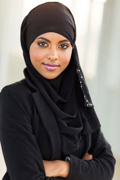 young muslim businesswoman with arms crossed