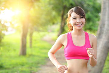 Fototapeta premium Running woman in park