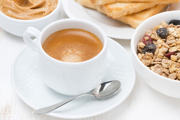 freshly brewed espresso and muesli for breakfast