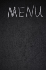menu title is written white chalk on a blackboard