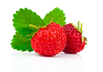 Strawberries with leaves. Isolated on a white background.