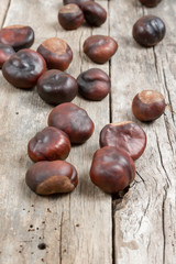 Closeup chestnuts on wooden desk