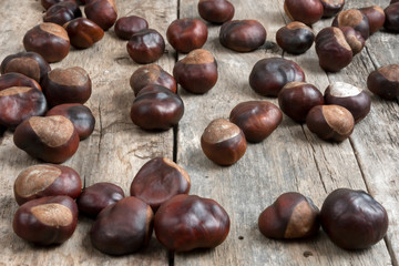 Closeup chestnuts on wooden desk