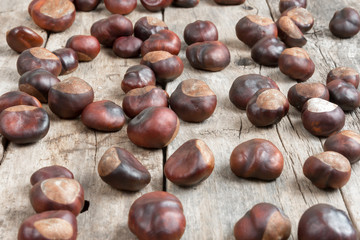 Closeup chestnuts on wooden desk