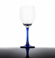 Empty wineglass with reflection