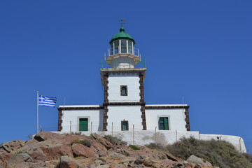 Fototapeta na wymiar Lighthouse near Akrotiri, Santorini Island