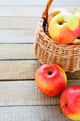 fresh apples in a wicker basket