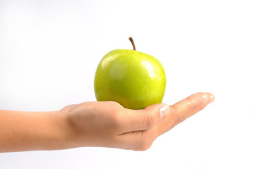 hand with green apple isolated on white background