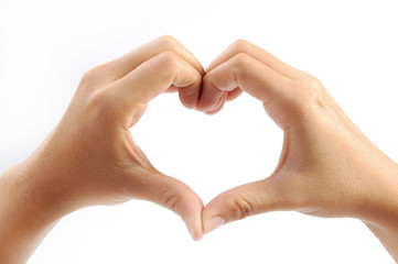 Female hands in the form of heart isolated on white background