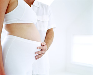 pregnant woman on a white background