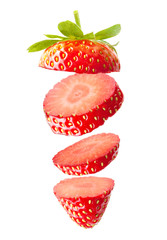 Falling strawberry isolated on white