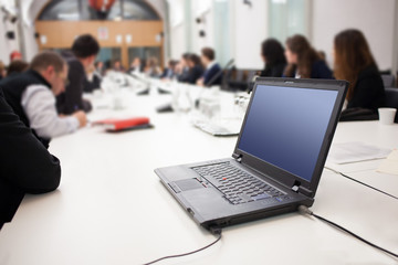 laptop on table at workshop