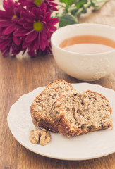 Fruit and nut cake and cup of tea