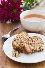 Fruit and nut cake and cup of tea