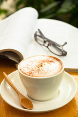 cup of coffee with book