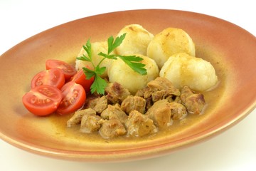 dumplings with sauce and tomato