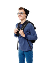 Trendy teenager with backpack wearing cap and glasses