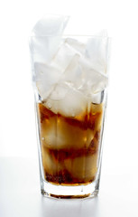 Cola with ice in glass