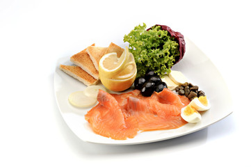 fresh salmon with salad and olives