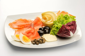 fresh salmon with salad and olives